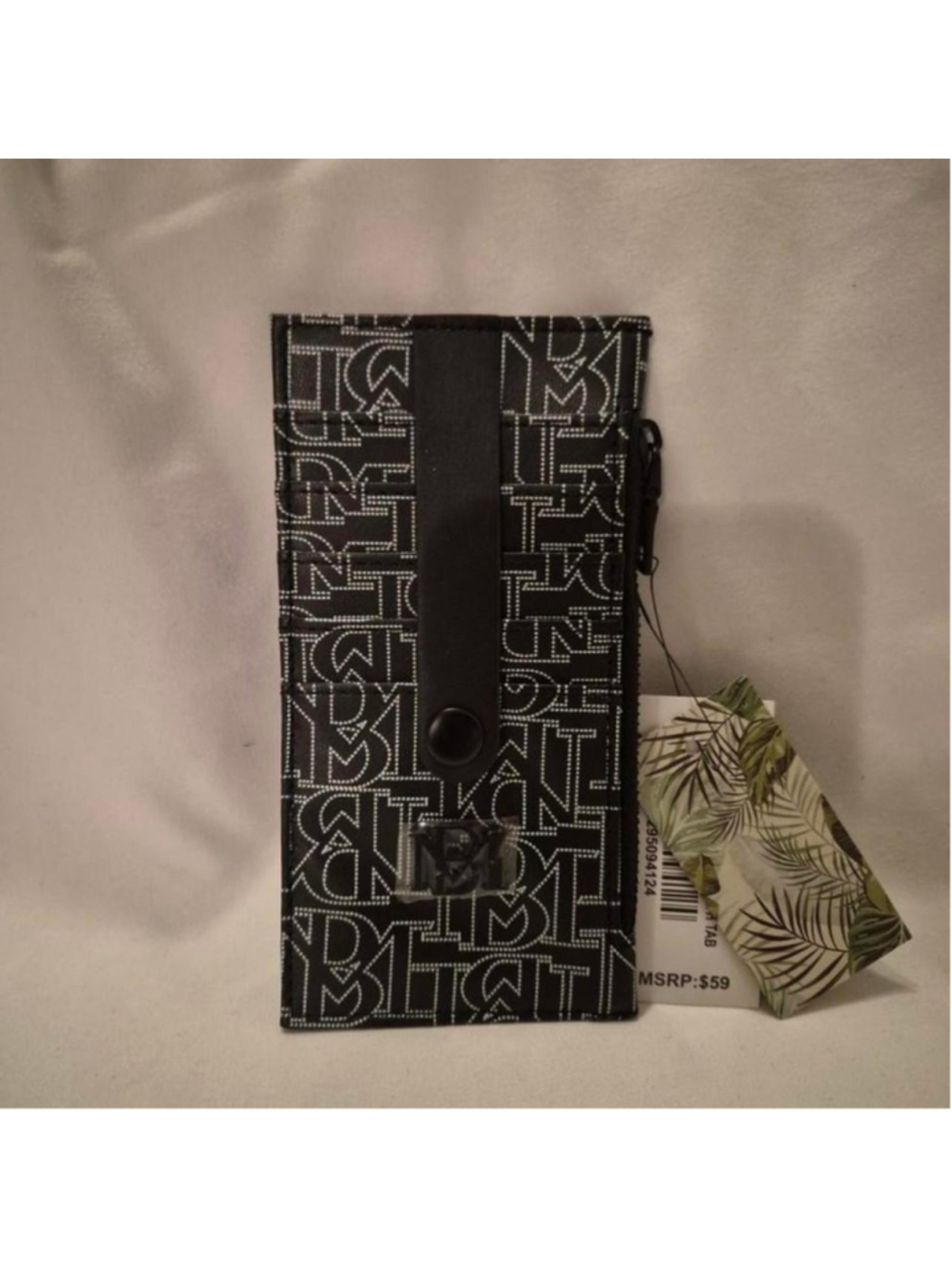 Mischka Badgley Black Credit Card Holder with Tab
A stylish black credit card h - Picture 2 of 2